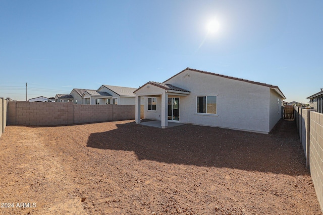 rear view of house featuring a patio area