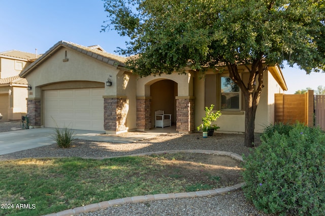 view of front of property with a garage