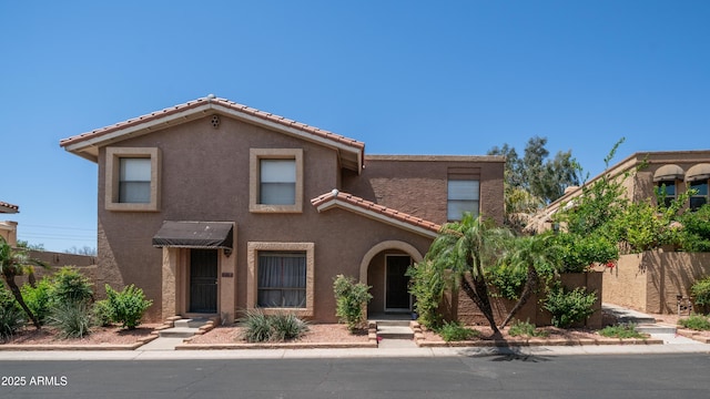 10420 N 10th St Unit 2, Phoenix, AZ 85020 - view of front of home with stucco siding and a tiled roof