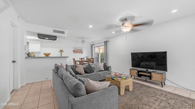 10420 N 10th St Unit 2, Phoenix, AZ 85020 - living area featuring ceiling fan, light tile patterned floors, recessed lighting, and baseboards