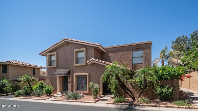 10420 N 10th St Unit 2, Phoenix, AZ 85020 - view of front of property featuring stucco siding and a tile roof