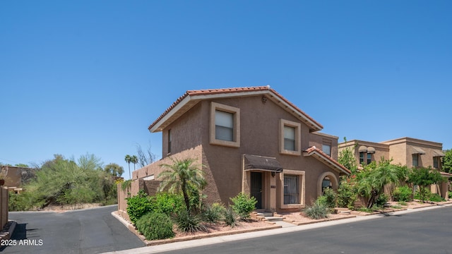 10420 N 10th St Unit 2, Phoenix, AZ 85020 - view of front of property featuring stucco siding and a tile roof