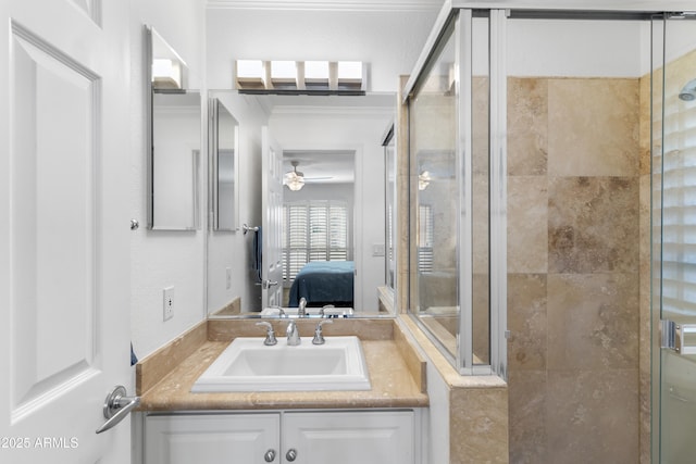 bathroom featuring vanity, a stall shower, ensuite bathroom, and ceiling fan