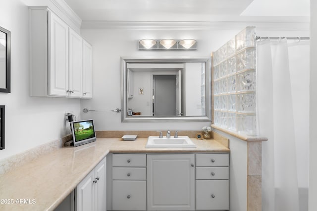 full bathroom featuring vanity and crown molding