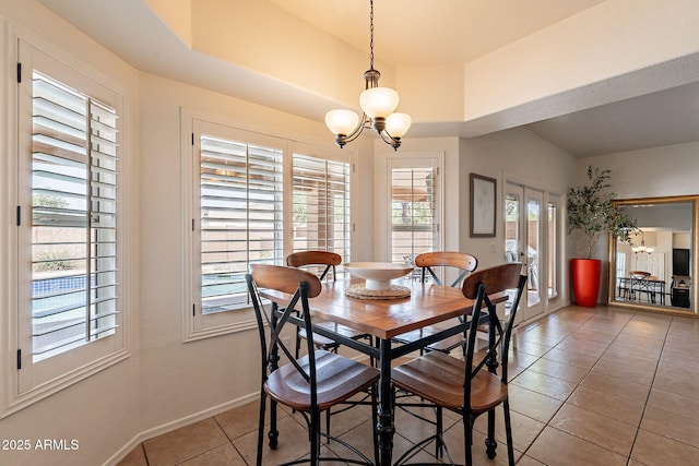 1125 S Larkspur St, Gilbert, AZ 85296 - dining area with a chandelier, light tile patterned floors, and baseboards