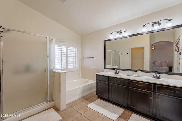 1125 S Larkspur St, Gilbert, AZ 85296 - full bathroom with a shower stall, a garden tub, tile patterned flooring, double vanity, and ensuite bathroom