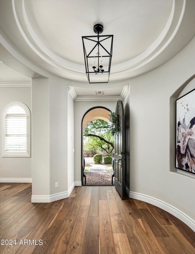 dining area with dark hardwood / wood-style floors and a chandelier