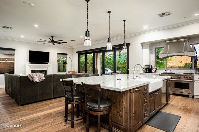 office area with crown molding, hardwood / wood-style floors, and a notable chandelier