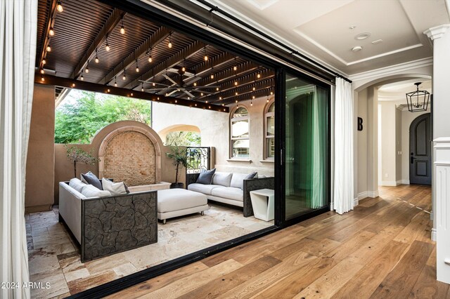 bathroom with vanity, toilet, a chandelier, a shower with shower door, and crown molding