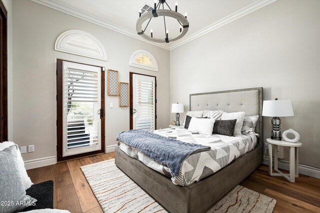 hall with ornamental molding and light hardwood / wood-style floors