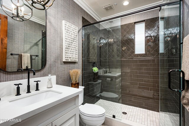 bedroom with ceiling fan, ornamental molding, and light hardwood / wood-style floors