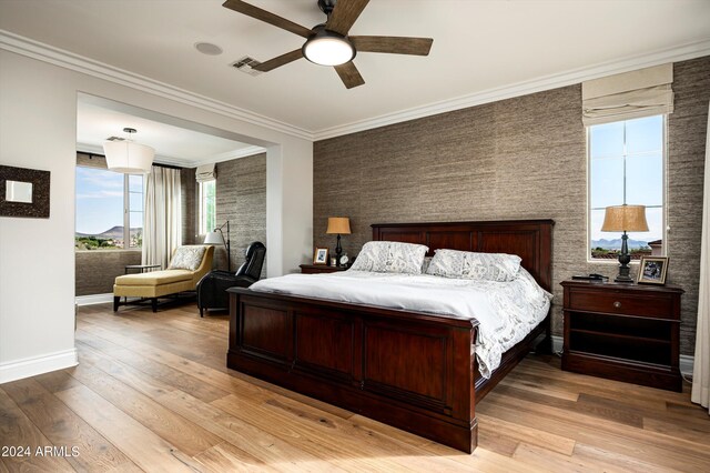 bathroom featuring crown molding, vanity, an inviting chandelier, and plus walk in shower