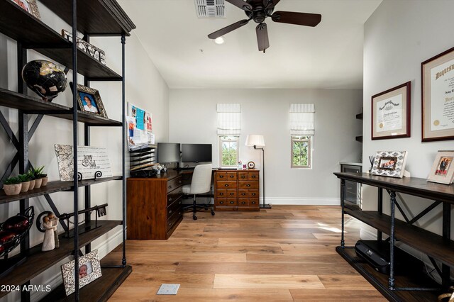 bedroom featuring ceiling fan, ornamental molding, and hardwood / wood-style flooring