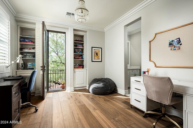 laundry area featuring washer and clothes dryer, light tile patterned flooring, cabinets, crown molding, and sink