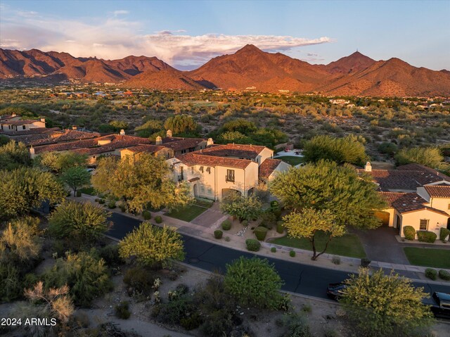 aerial view at dusk with a mountain view