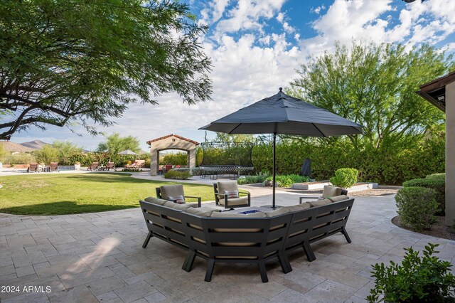 view of swimming pool with a gazebo, a yard, and a patio