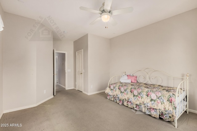 bedroom with carpet floors, baseboards, and a ceiling fan