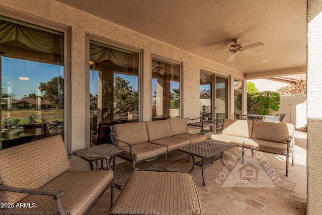 view of patio with ceiling fan and an outdoor hangout area