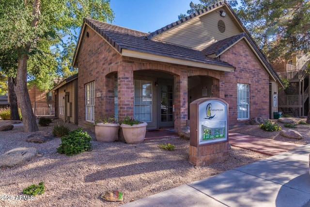 view of front of house with a tile roof