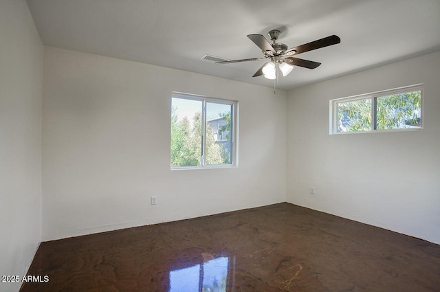 3841 N 21st Ave, Phoenix, AZ 85015 - unfurnished room with healthy amount of natural light and a ceiling fan