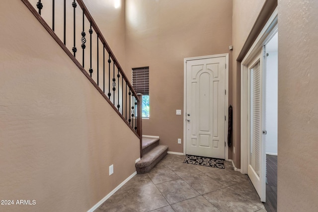 entrance foyer featuring light tile patterned floors