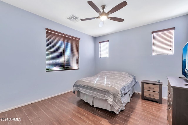 bedroom featuring ceiling fan and light wood-type flooring