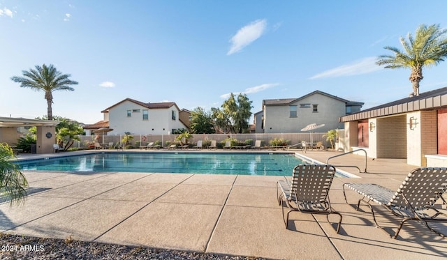 view of pool featuring a patio