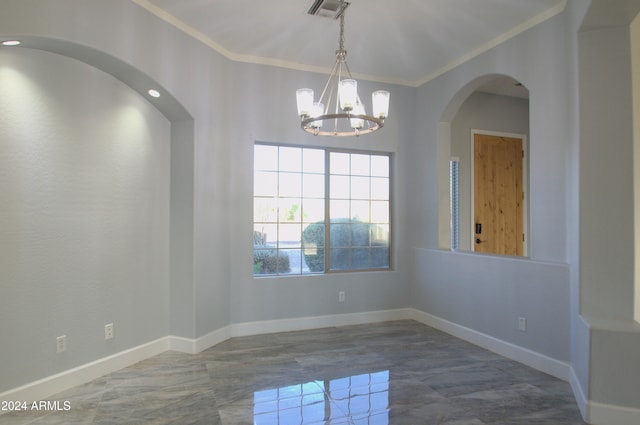 empty room with ornamental molding and a chandelier