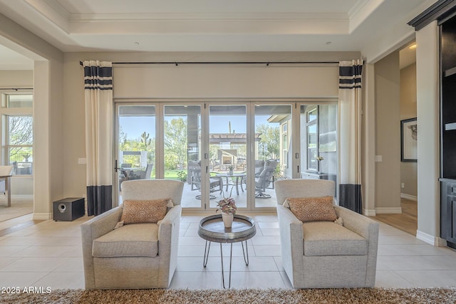 8768 E Granite Pass Rd, Scottsdale, AZ 85266 - living area with a tray ceiling, a wealth of natural light, and crown molding