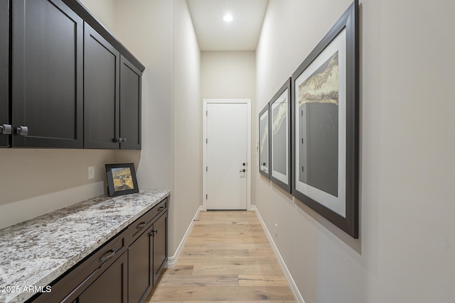 8768 E Granite Pass Rd, Scottsdale, AZ 85266 - hall with baseboards and light wood-style flooring