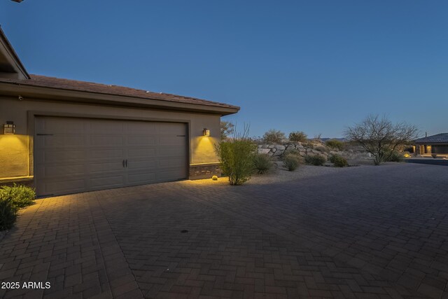 8768 E Granite Pass Rd, Scottsdale, AZ 85266 - garage featuring decorative driveway