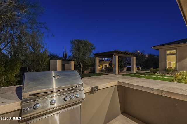 8768 E Granite Pass Rd, Scottsdale, AZ 85266 - patio at twilight with a pergola, grilling area, and area for grilling