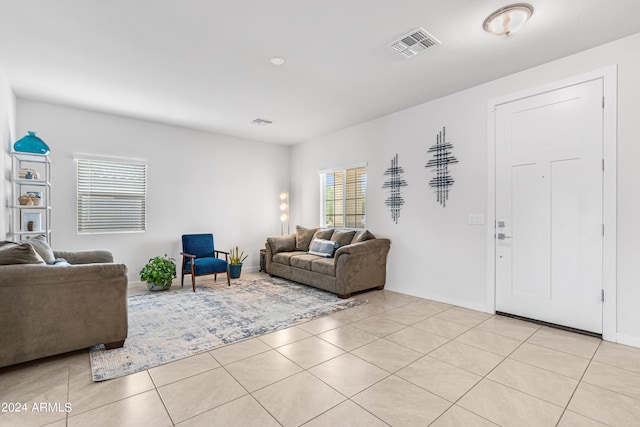 living room featuring light tile patterned floors