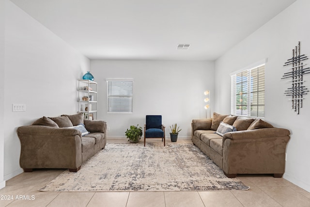 living room with light tile patterned floors