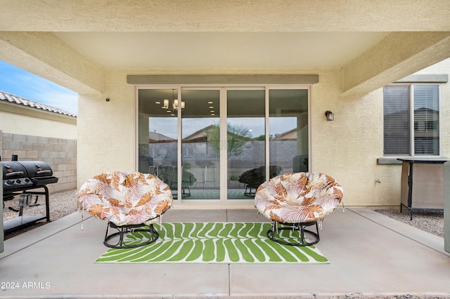 view of patio featuring a grill