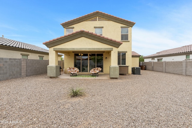 rear view of house with a patio