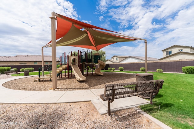 view of playground with a yard