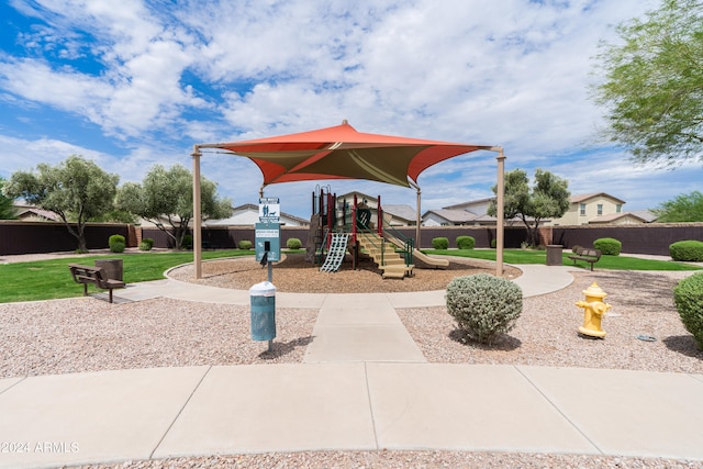 view of play area featuring a lawn