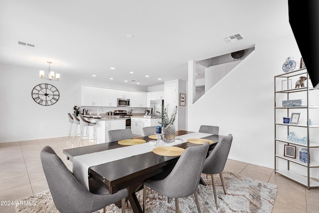 dining room featuring light tile patterned floors