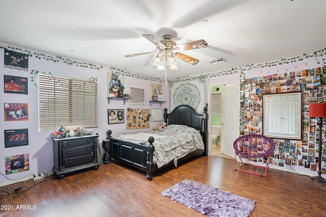 bedroom featuring ceiling fan and wood-type flooring