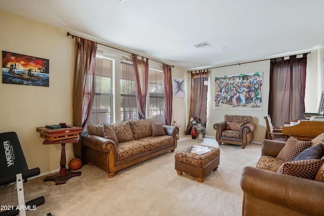 living room featuring light colored carpet