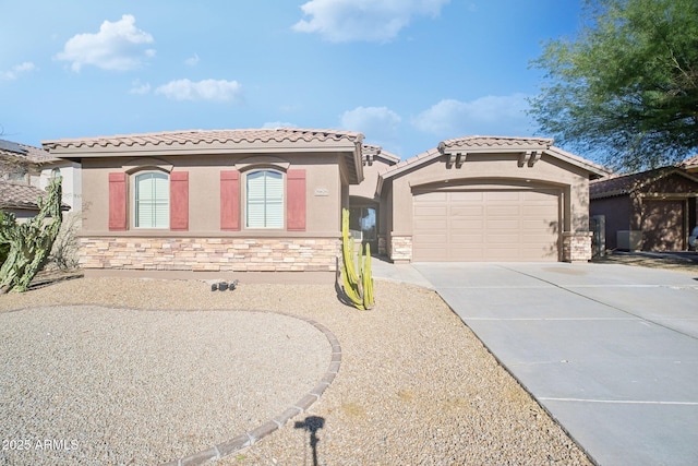 mediterranean / spanish-style house featuring a garage