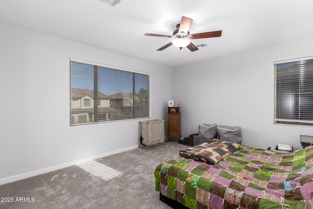 bedroom with light carpet and ceiling fan