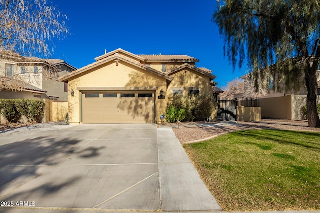 mediterranean / spanish house with a garage and a front yard