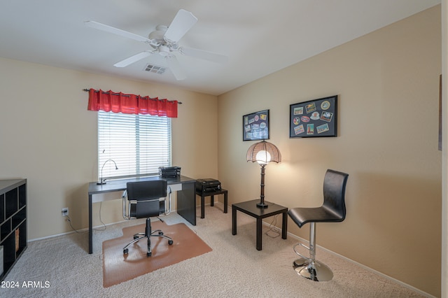 office space featuring light colored carpet and ceiling fan