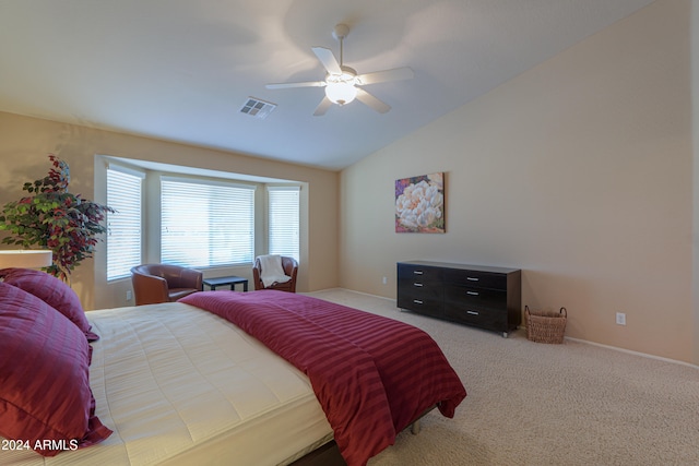 carpeted bedroom featuring ceiling fan and lofted ceiling