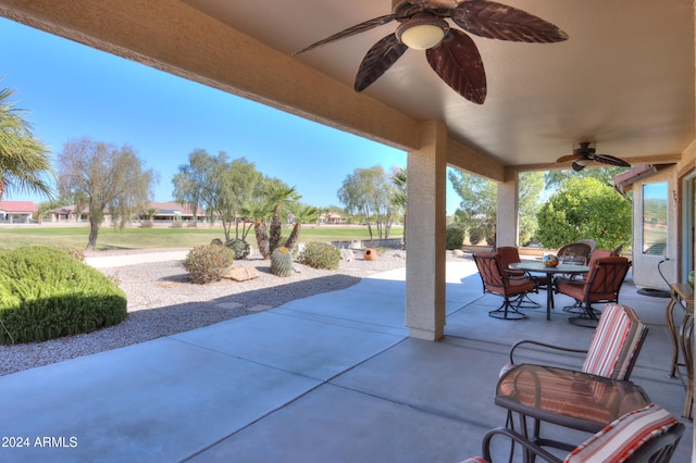 view of patio / terrace featuring ceiling fan