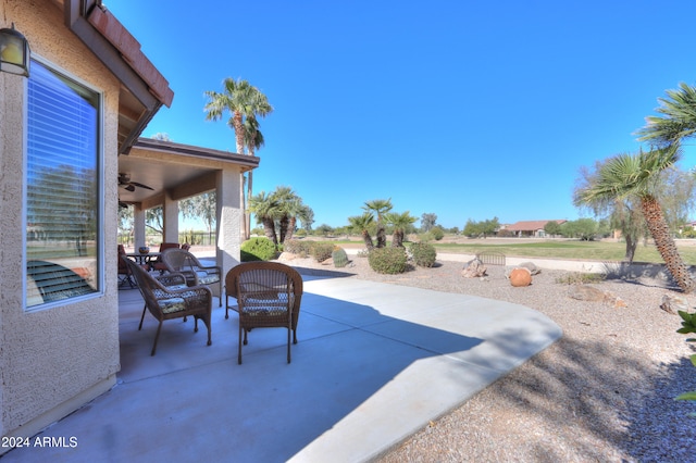 view of patio featuring ceiling fan