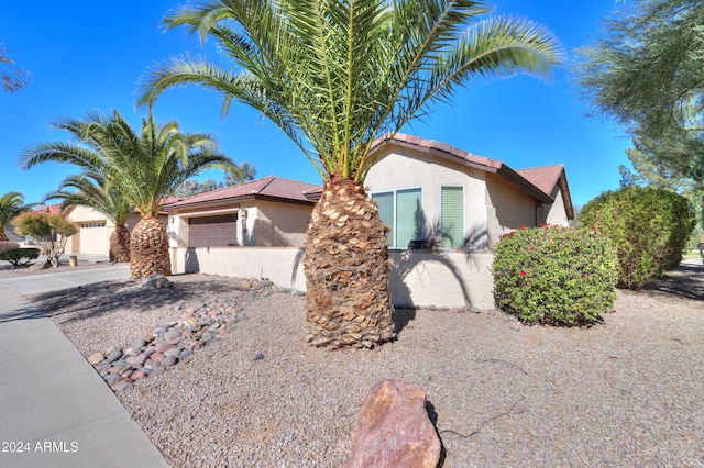 view of front of home with a garage