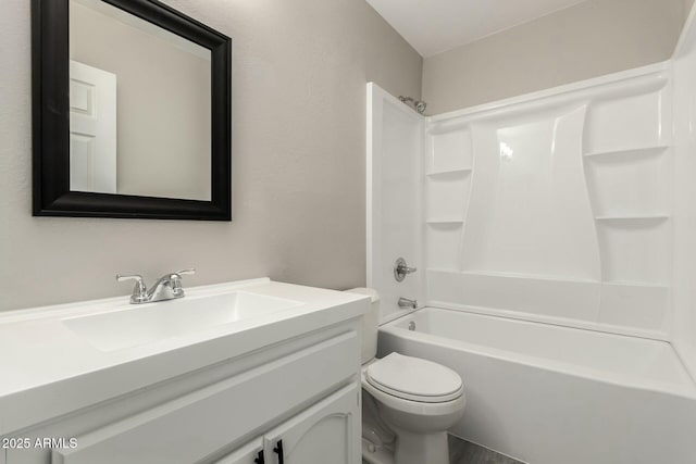 full bathroom featuring vanity, shower / tub combination, and toilet